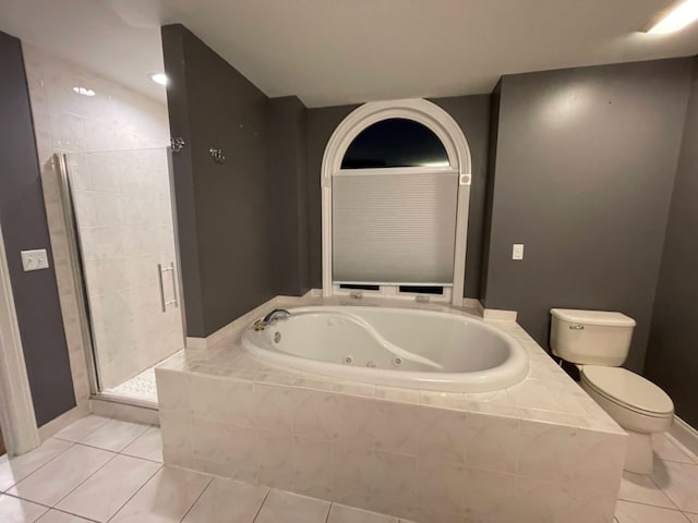 bathroom with tile patterned floors, independent shower and bath, and toilet