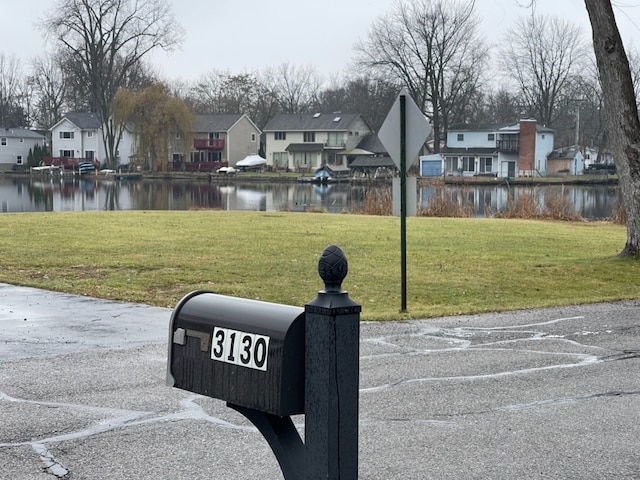 view of yard with a water view