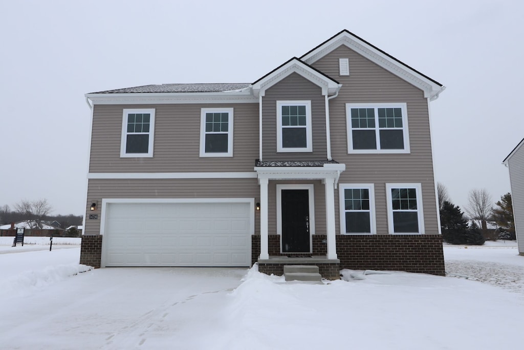 front of property featuring a garage