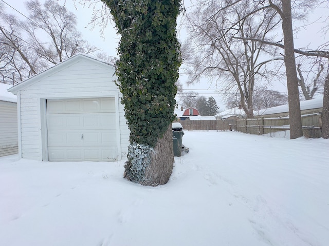 view of snow covered garage