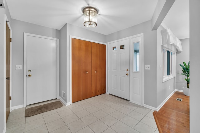 view of tiled foyer entrance