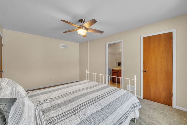 carpeted bedroom with ceiling fan