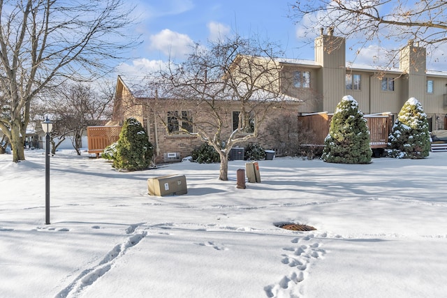 view of snow covered house