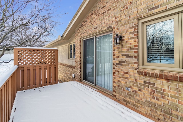 view of snow covered deck