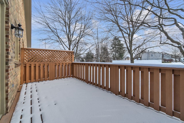 view of snow covered deck