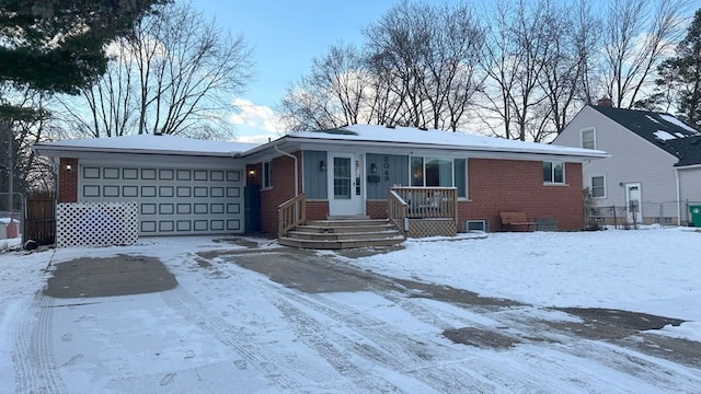 view of front of property featuring a garage