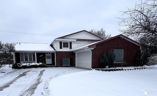 view of front of property featuring a garage