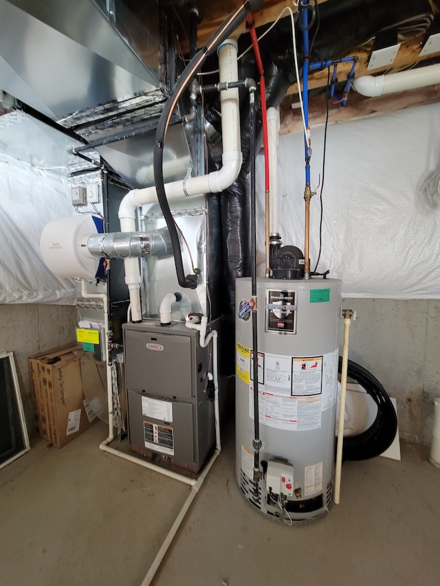 utility room with water heater