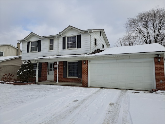 front of property with a garage