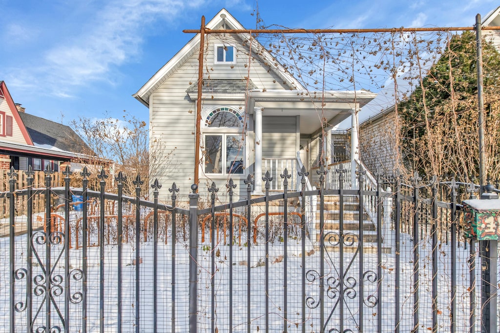 view of gate with a porch