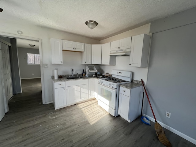 kitchen featuring sink, a textured ceiling, white cabinetry, and white gas stove