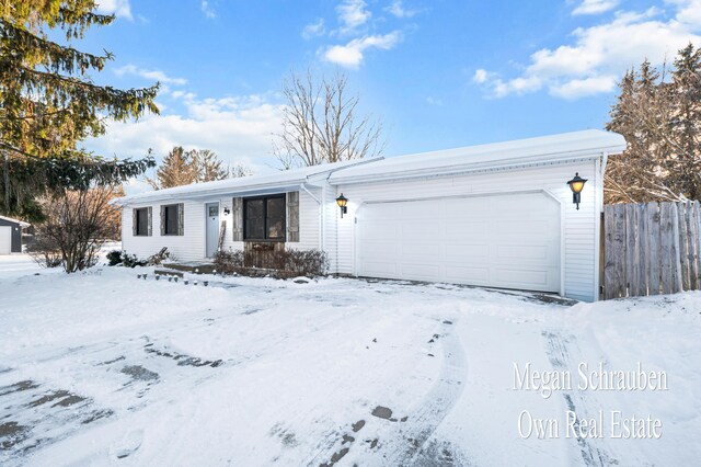 single story home featuring a garage