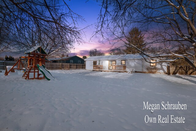 view of snow covered playground