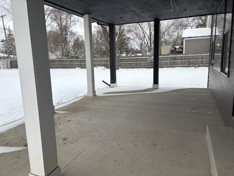 view of snow covered patio