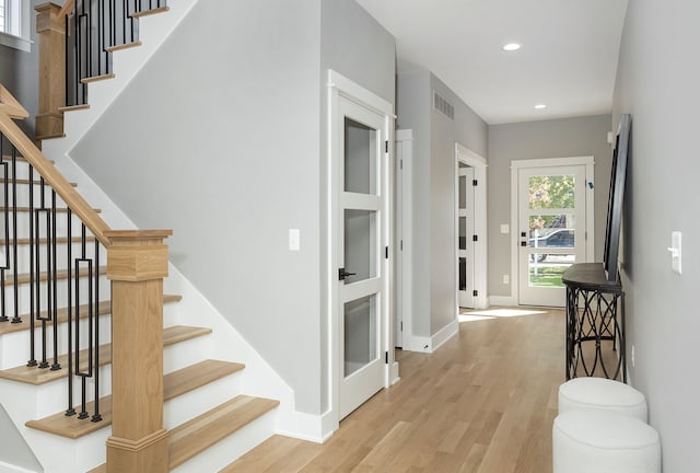 hall featuring light hardwood / wood-style flooring