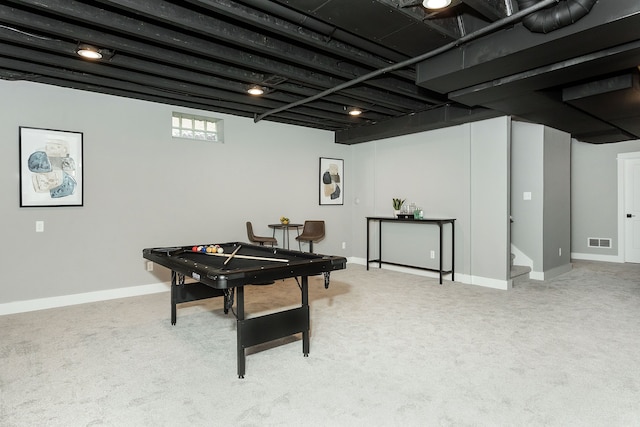 recreation room featuring light colored carpet