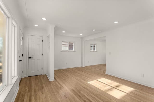 spare room featuring light hardwood / wood-style floors