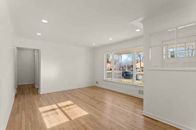 empty room with light wood-type flooring