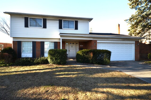 front facade with a garage