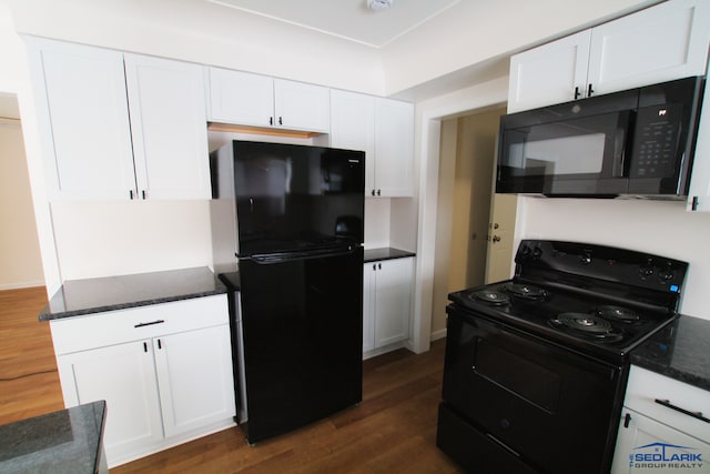 kitchen with black appliances, dark wood-type flooring, and white cabinetry