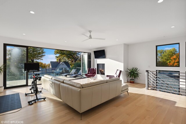 living room with light hardwood / wood-style flooring