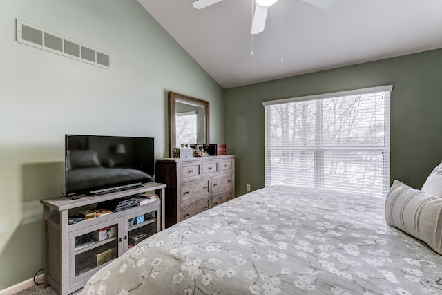 bedroom with ceiling fan and lofted ceiling