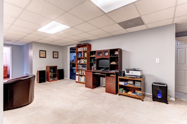 office with carpet floors and a paneled ceiling