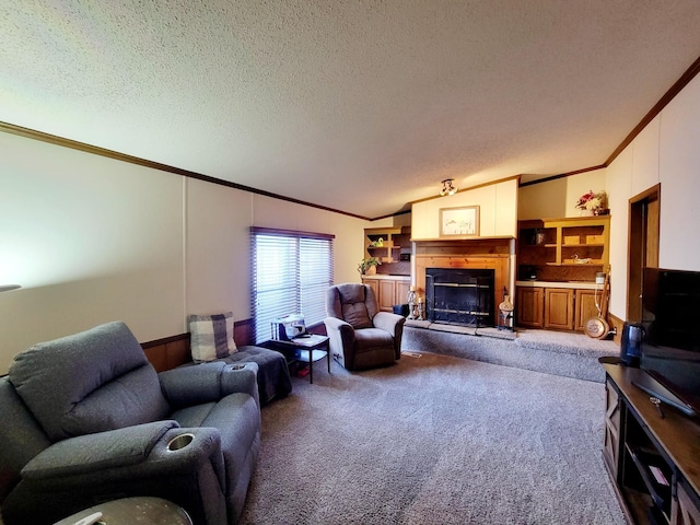 living room featuring lofted ceiling, a textured ceiling, ornamental molding, and carpet