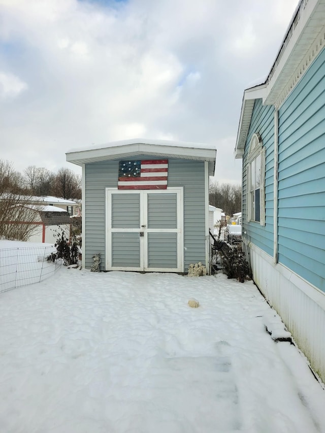 view of snow covered garage