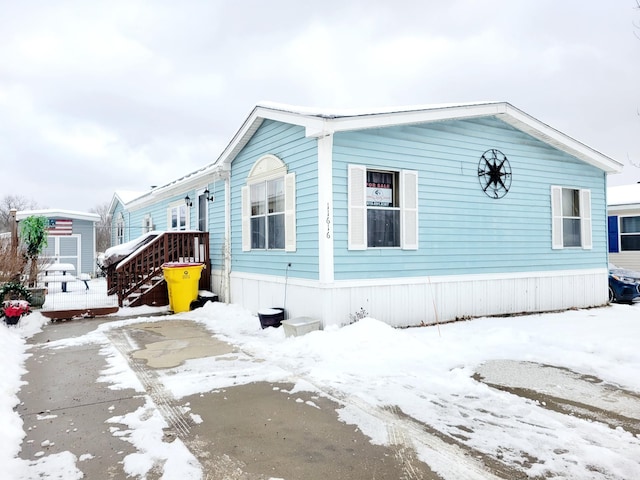 view of snow covered property