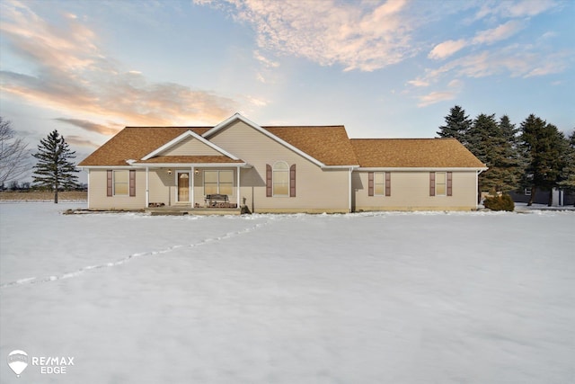 ranch-style home with a porch