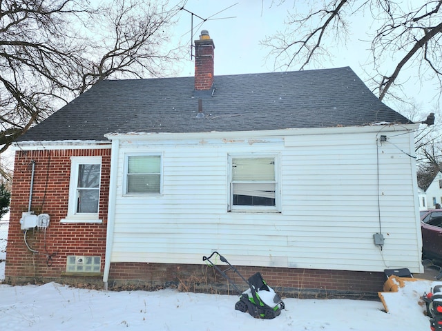 view of snow covered property