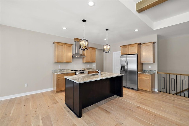 kitchen featuring stainless steel appliances, light wood-type flooring, light stone counters, beam ceiling, and wall chimney range hood