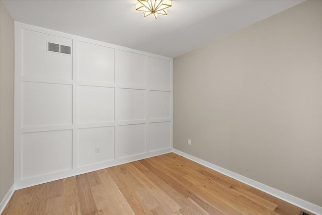 interior space featuring a closet and light hardwood / wood-style flooring