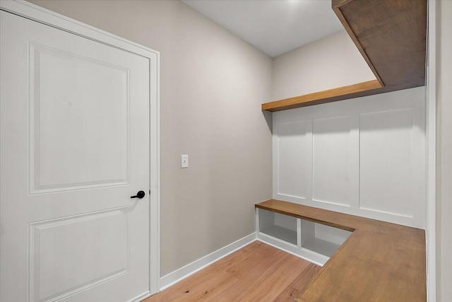 mudroom with light hardwood / wood-style flooring