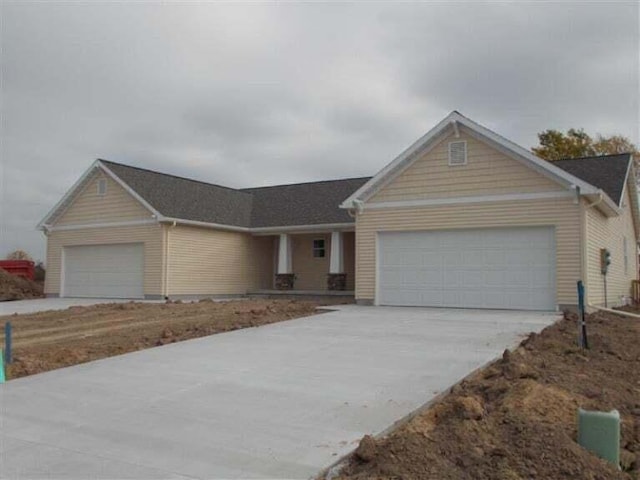 single story home featuring a garage