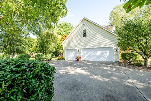 view of home's exterior with a garage