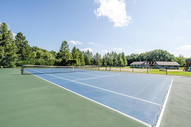 view of sport court with basketball hoop