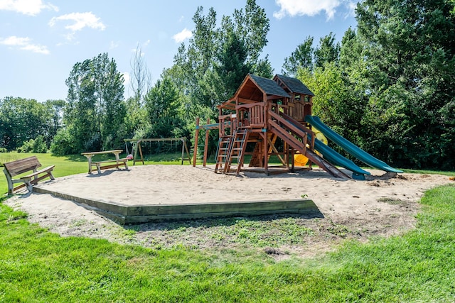 view of jungle gym featuring a lawn