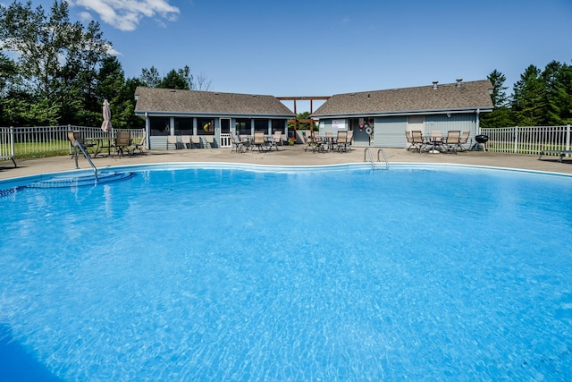 view of swimming pool featuring a patio