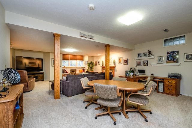 view of carpeted dining area