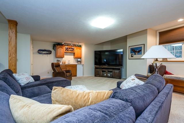 carpeted living room with indoor bar