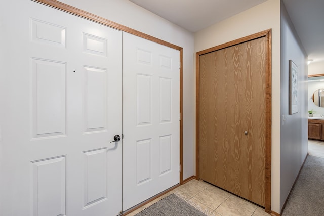 view of tiled foyer entrance