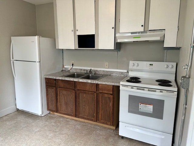 kitchen with white appliances and sink