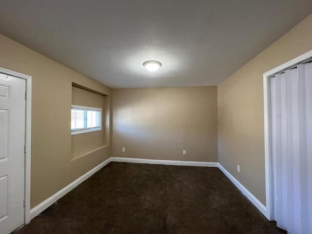 unfurnished bedroom with carpet floors