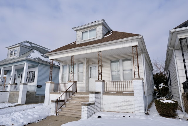 bungalow-style house with covered porch