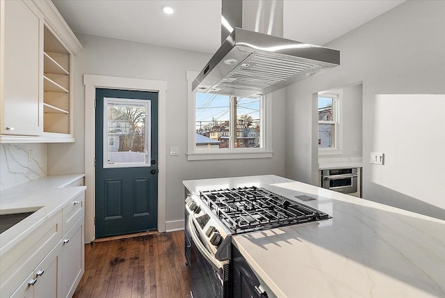 kitchen featuring open shelves, appliances with stainless steel finishes, island exhaust hood, and white cabinets