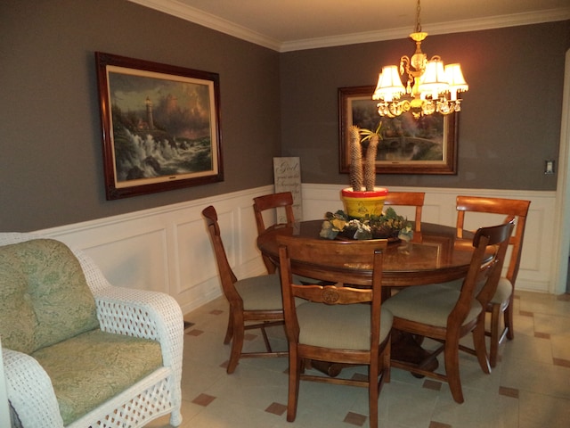 dining area featuring a notable chandelier and ornamental molding