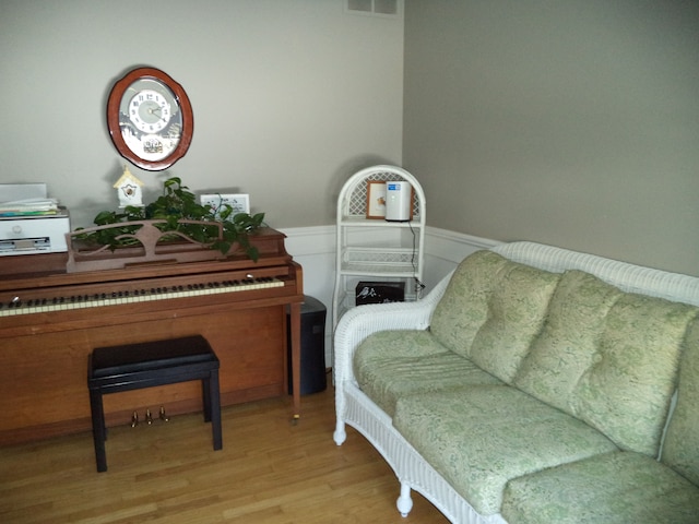 sitting room featuring light hardwood / wood-style flooring