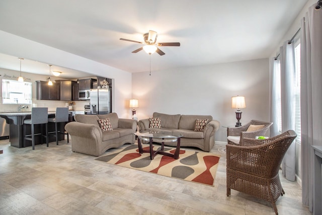 living room featuring ceiling fan